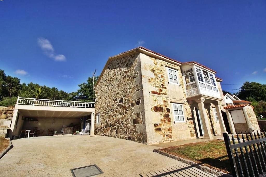 Гостевой дом Casa Ria Do Anllons Пуэнтесесо Экстерьер фото